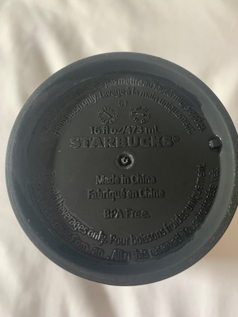 A black starbucks cup