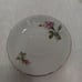 Vintage china tea cups and saucers with rose print and gold guilding.