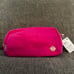 lululemon everywhere belt bag sonic pink white logo wordmark nwt
