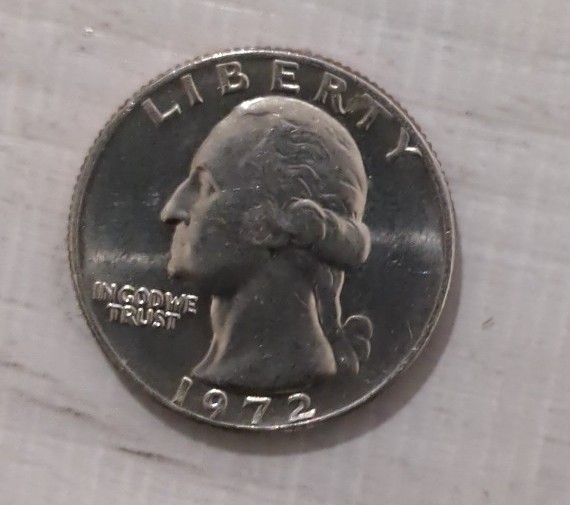 1972 Washington quarter silver no mint doubling around Liberty and God we trust
