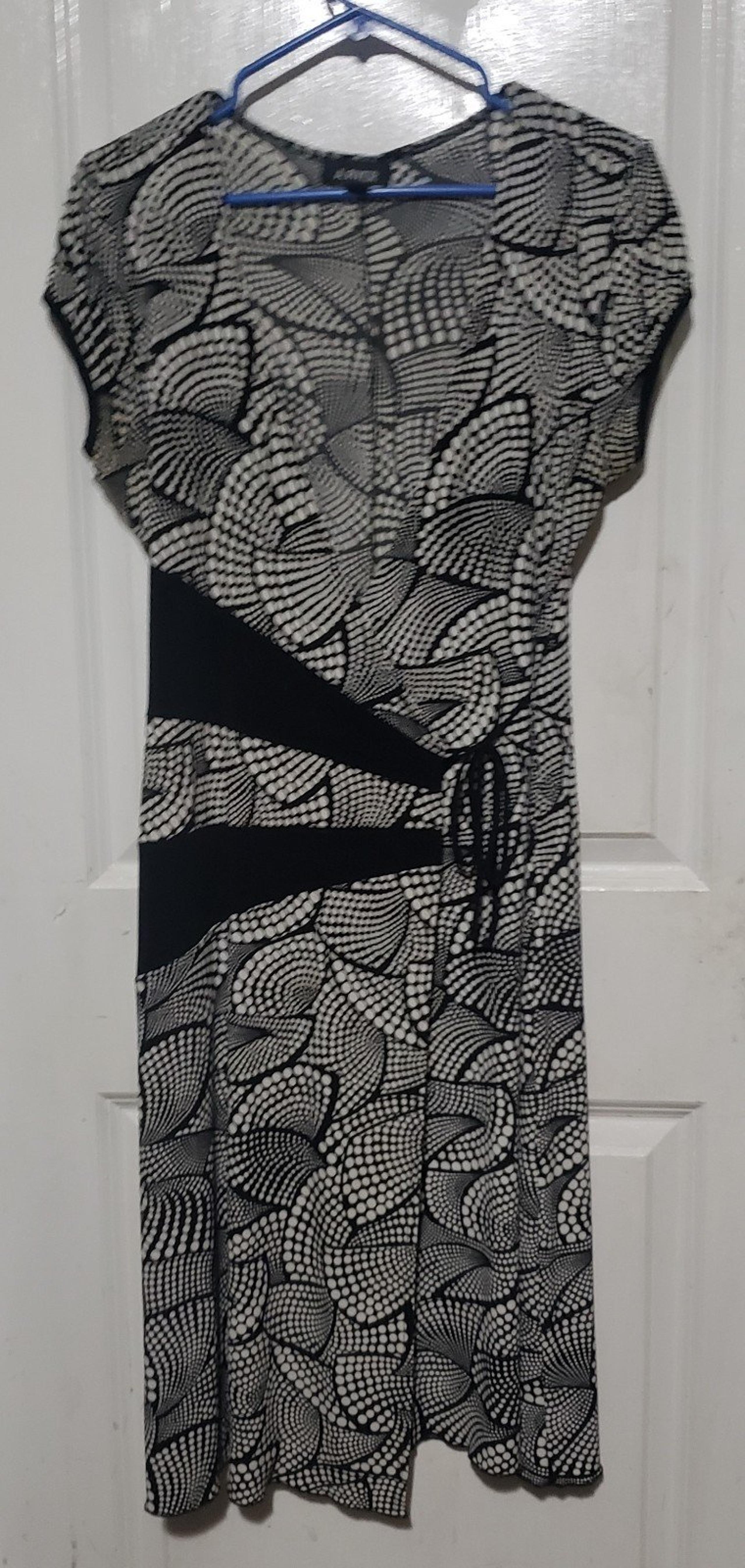 A. Byer wrap dress
. Black & White