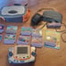 Vtech v smile lot, console, 10 games, car adapter, case and powerpack system