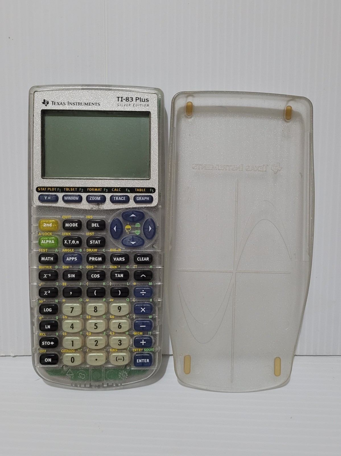 Texas Instruments TI-83 Plus Silver Edition Clear Transparent with Slide Cover.