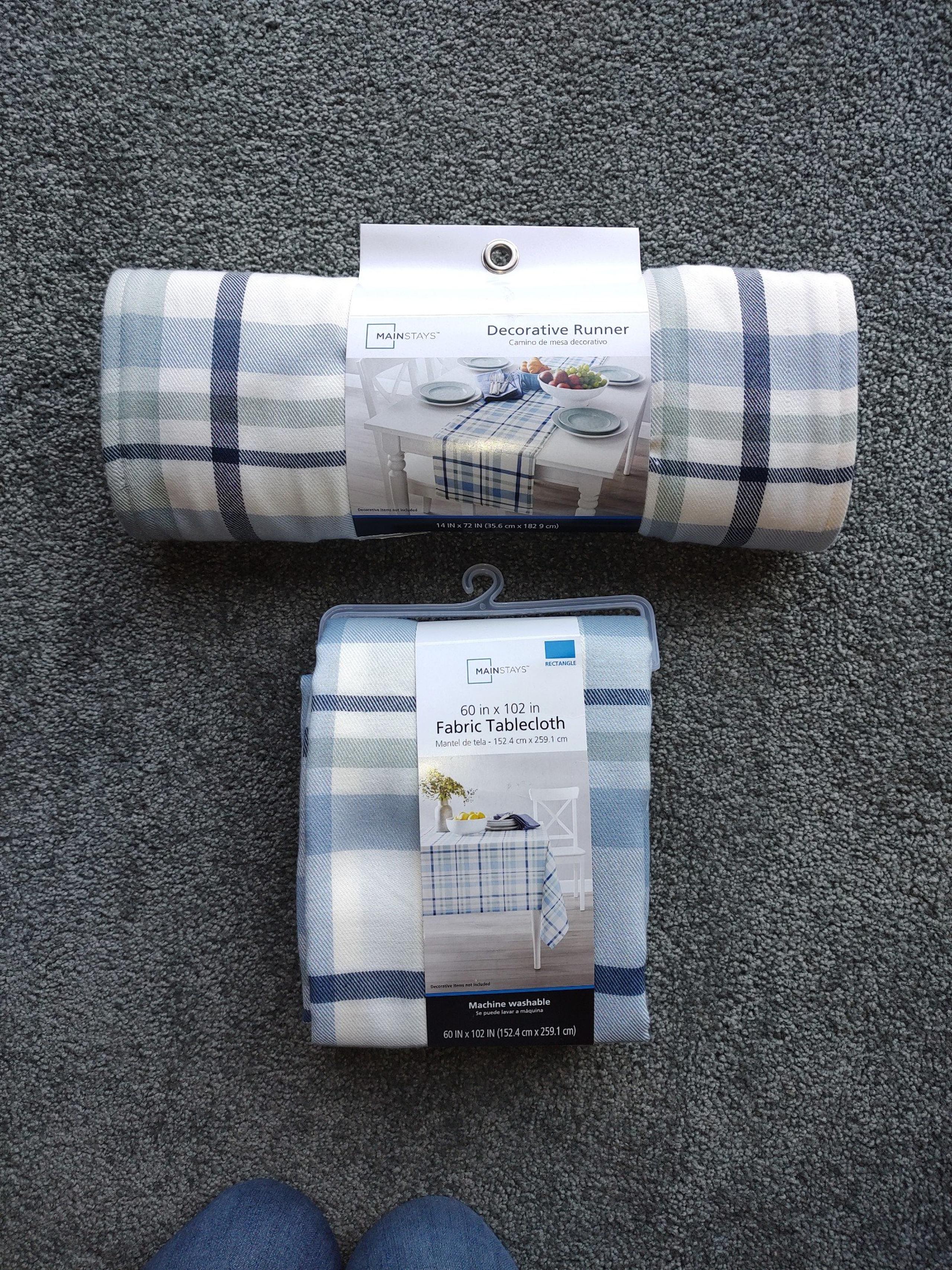 Mainstays fabric table cloth and decorative runner.