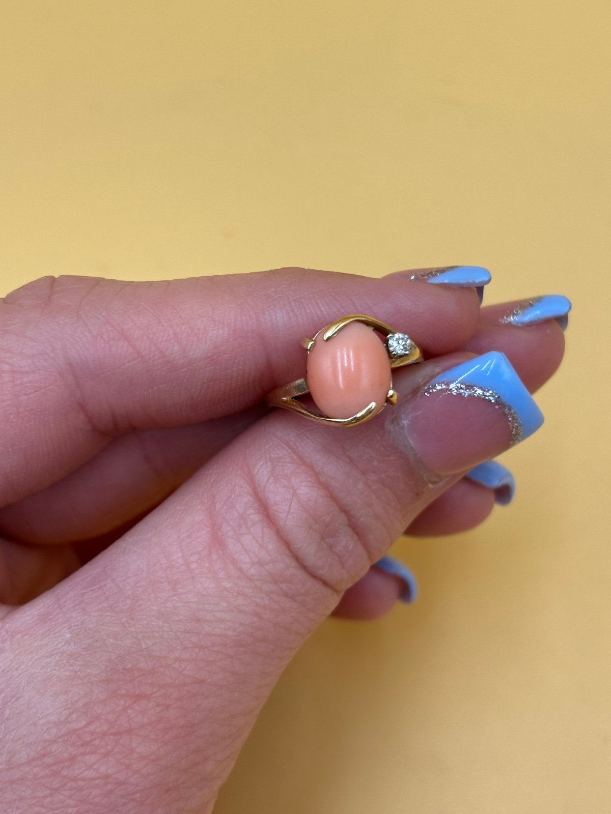 Coral, white sapphire and 14k gold ring