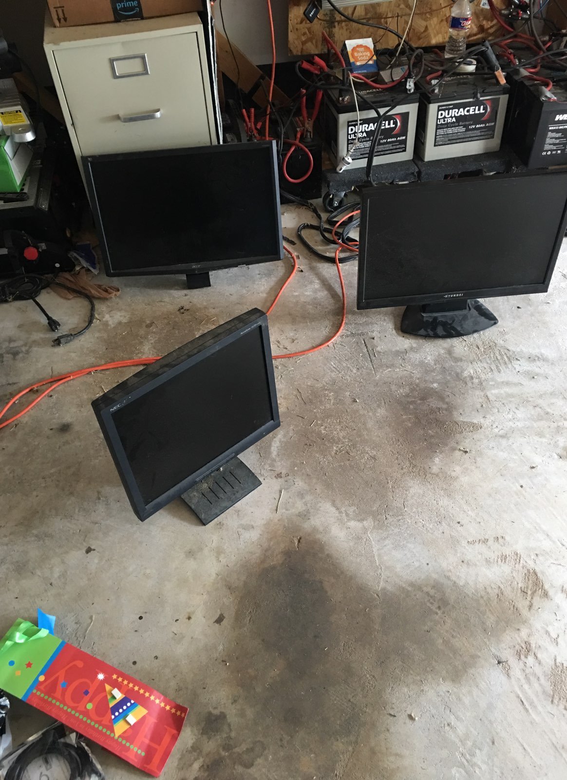 three monitors size 22, 15, 22