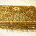 Vintage jewelry box shiny gold