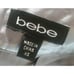 New With Tags BEBE sz XS shirt halter