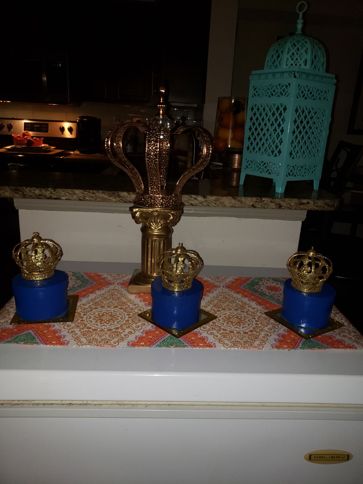 Gold and crystal crown on pedestal and 3