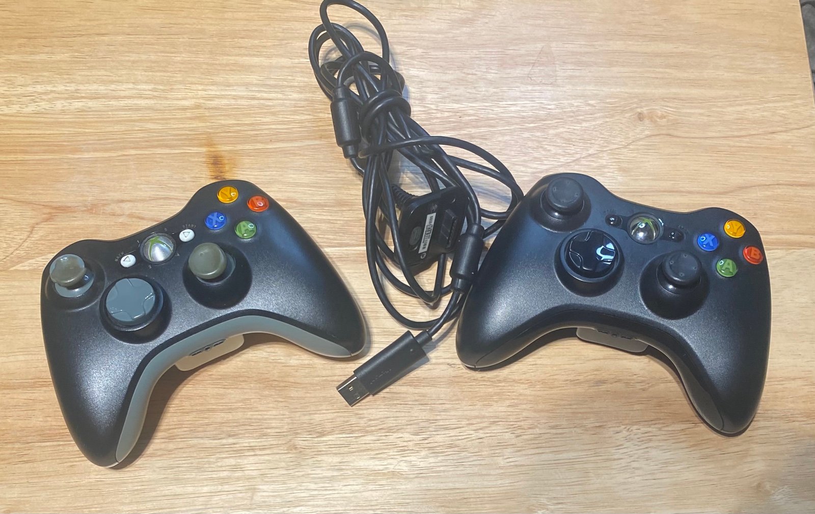 2 Microsoft Xbox 360 Black Wireless Controller’s With Charging Cable