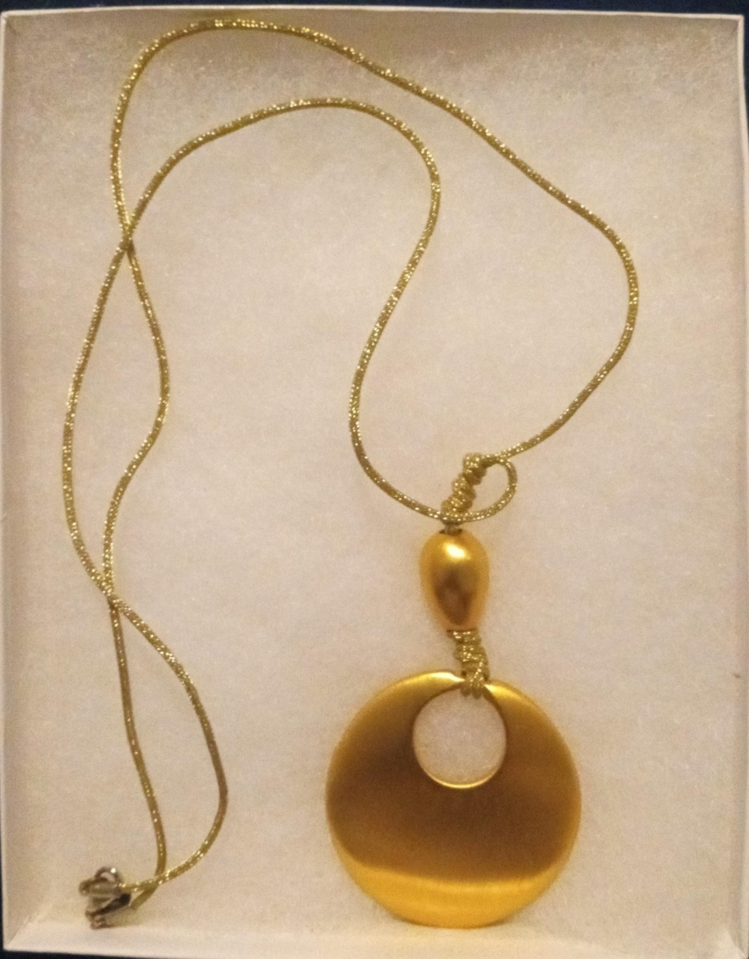 The limited GOLD Tone Disc Statement Necklace