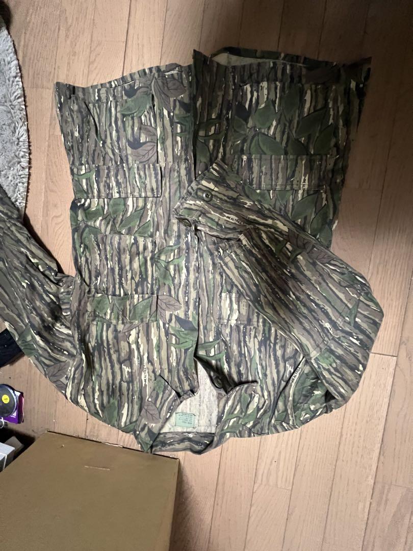 Camouflage jacket with multiple pockets