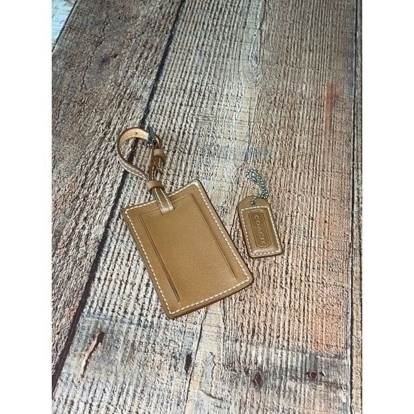 Coach duffle luggage tag and bag charm Tan