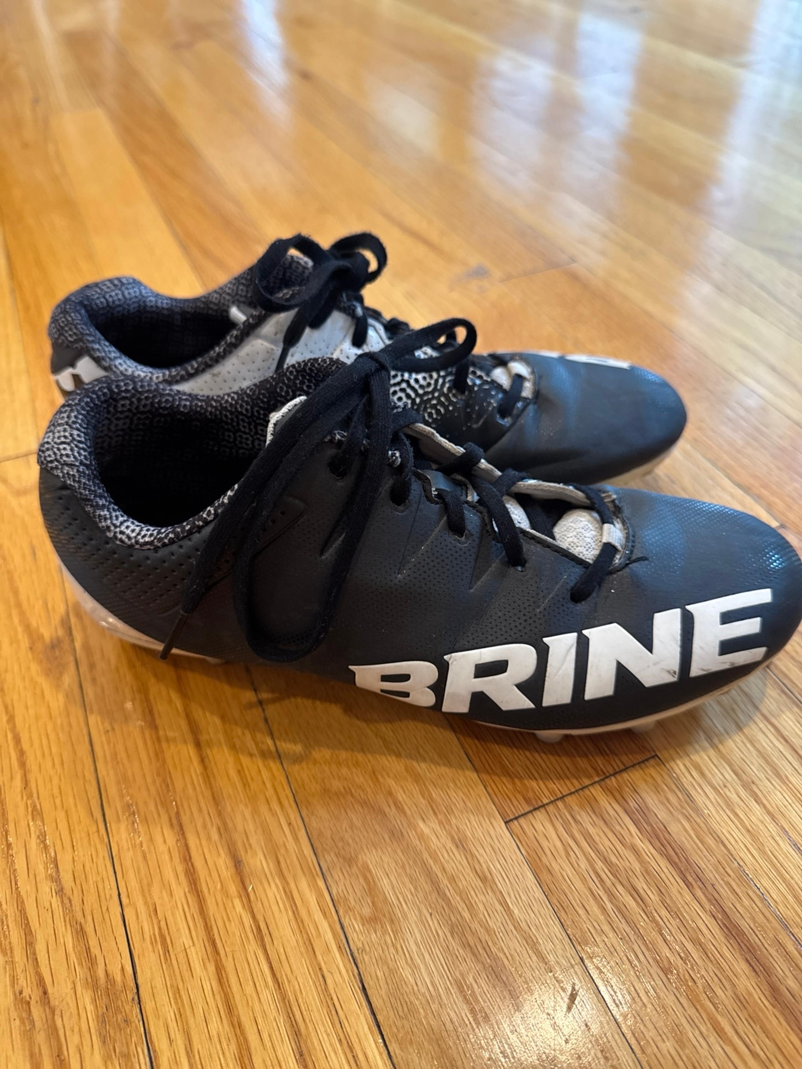 Woman’s size 8 black cleats