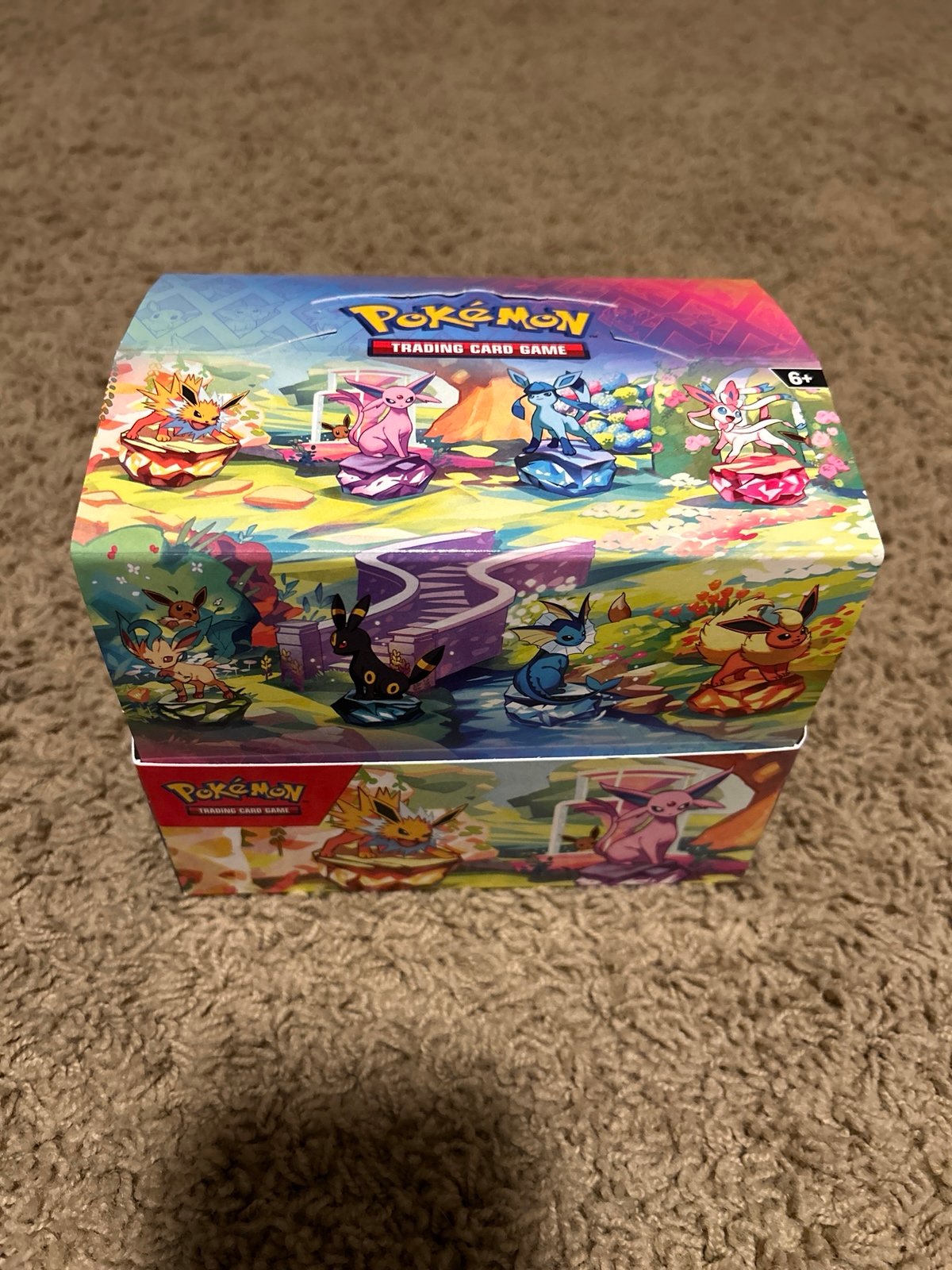 Pokemon Prismatic Evolution tins