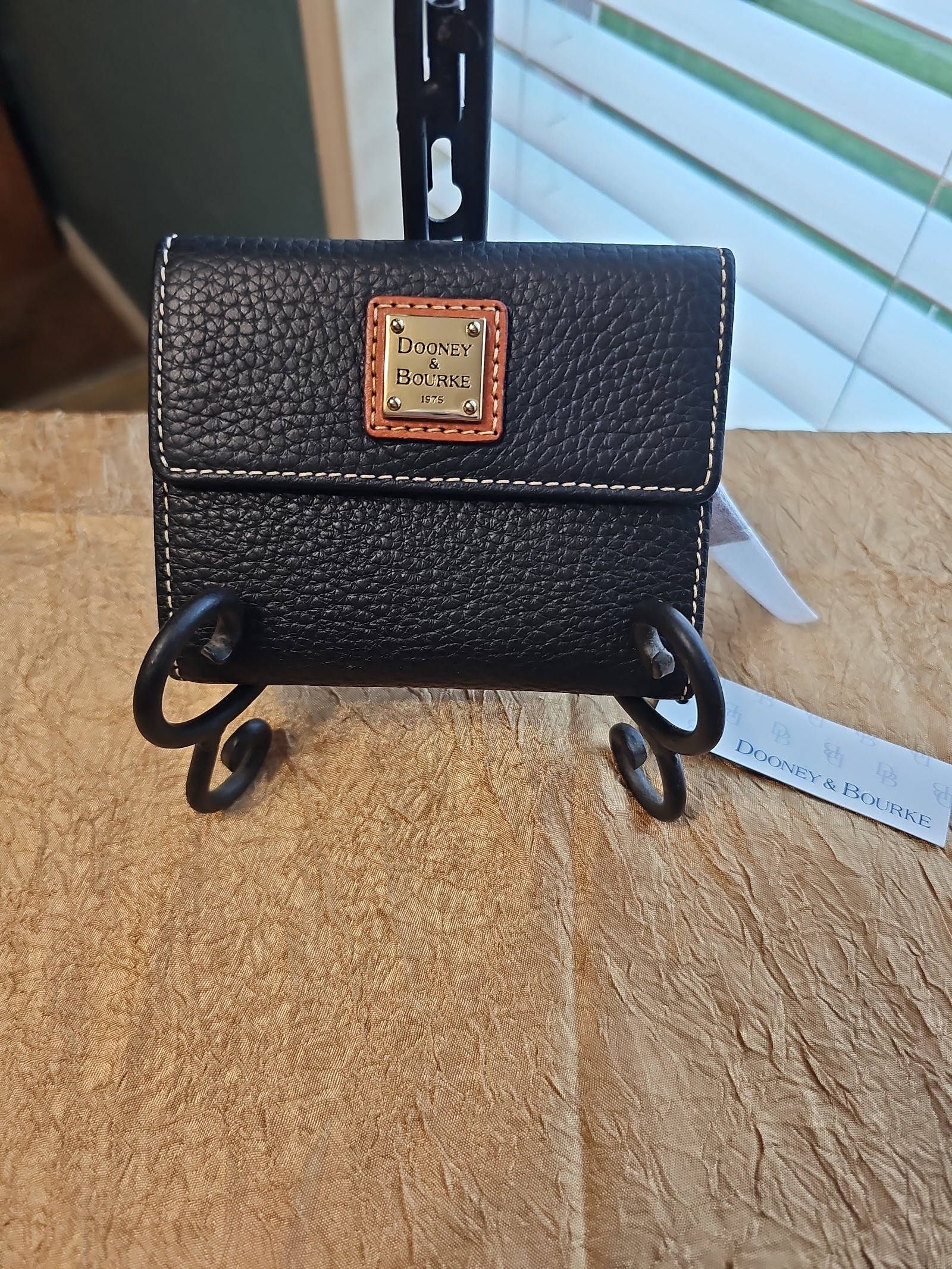 Dooney Bourke tri-fold wallet black