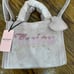 Juicy Couture pink mini pillow style tote bag with heart and rhinestone detail