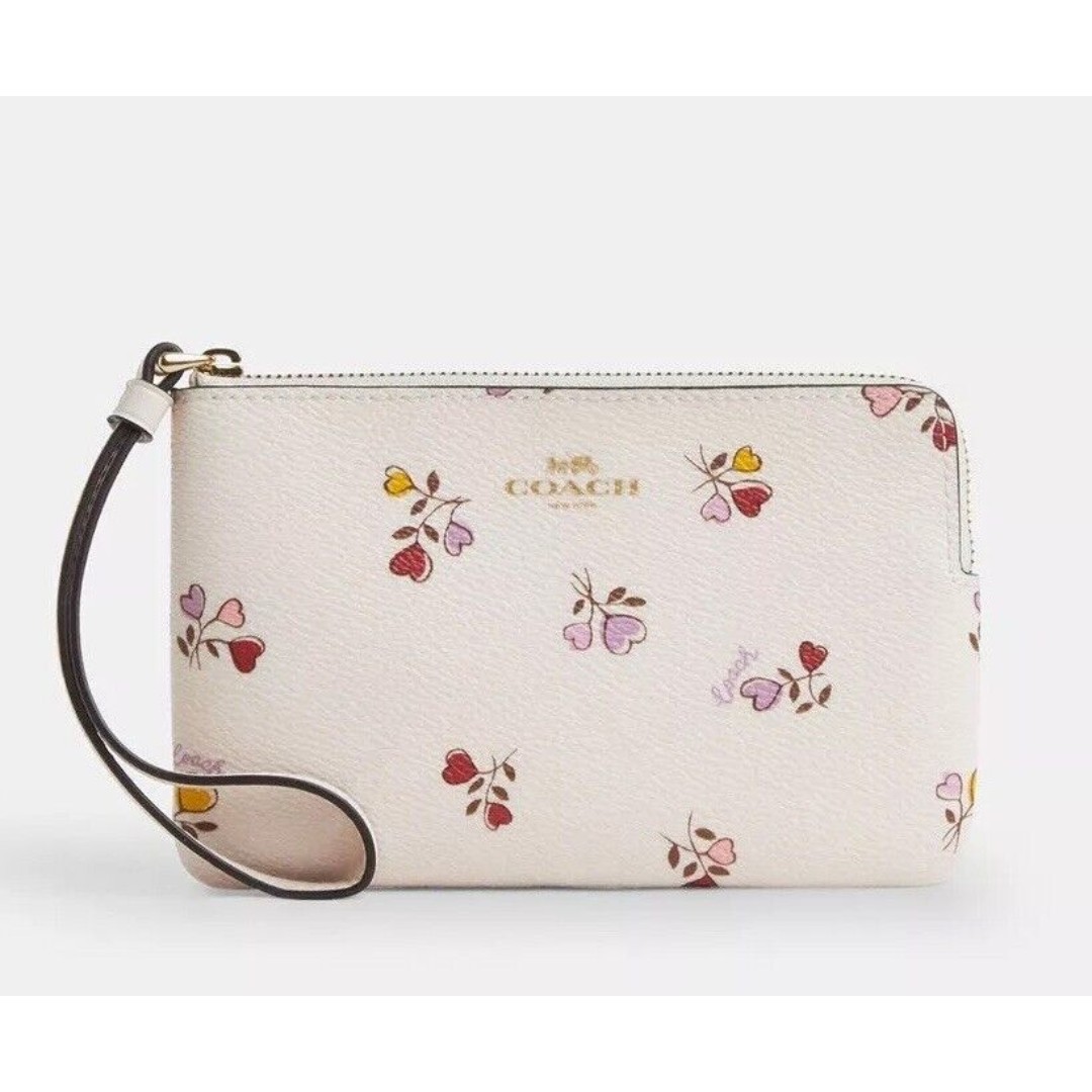 Coach corner zip wristlet with heart print