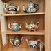 Collector Miniature Tea Pot Set w/cabinet