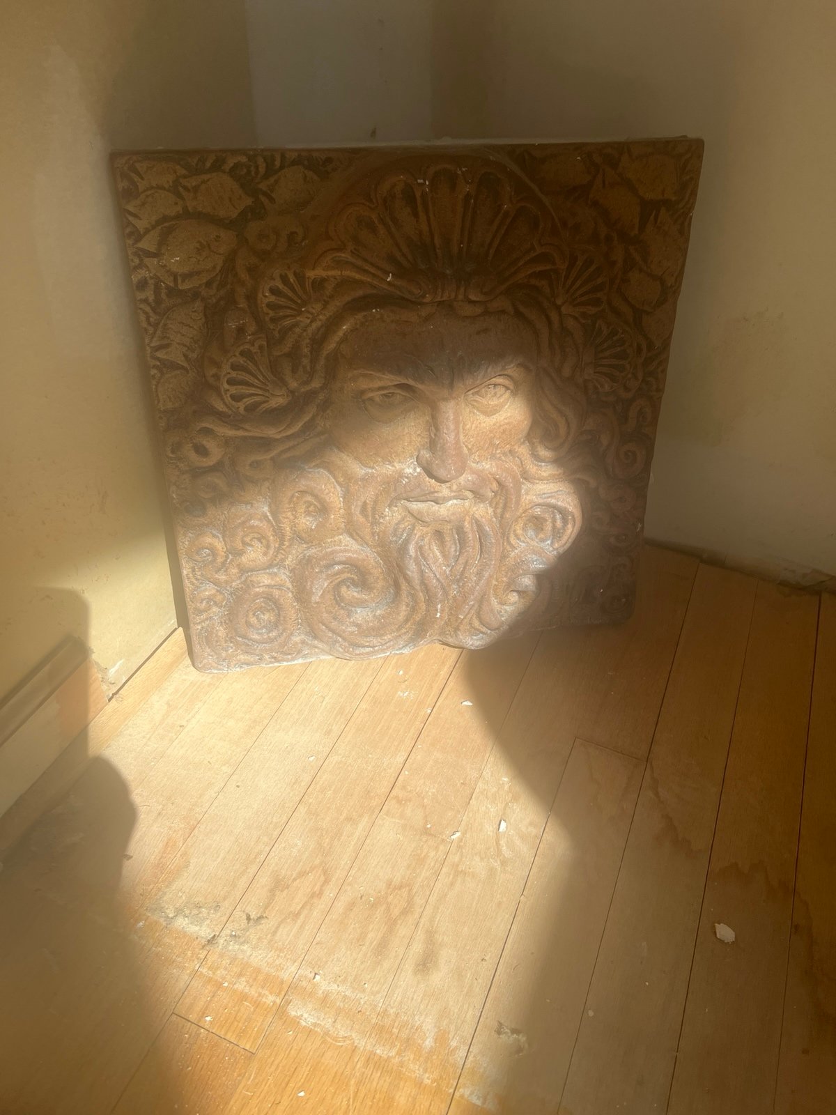Concret face of the god zeus.