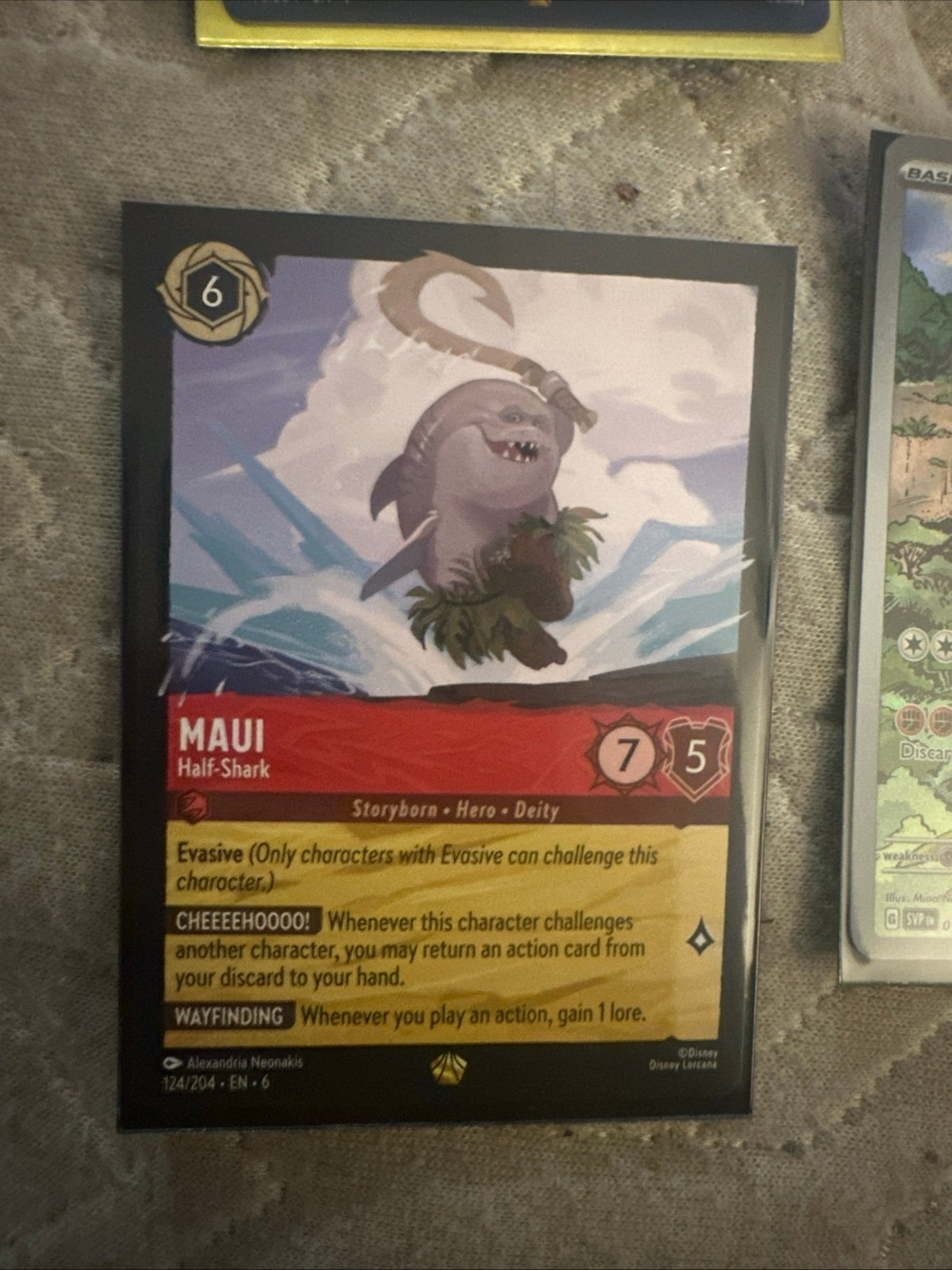 Disney Lorcana Maui half shark cold foil