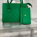 green leather purse