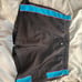 Black board shorts with blue detail