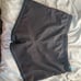 Black board shorts with blue detail