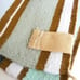 Hand woven artisan yarn wall hanging Janice Maxwell striped rustic aqua blue