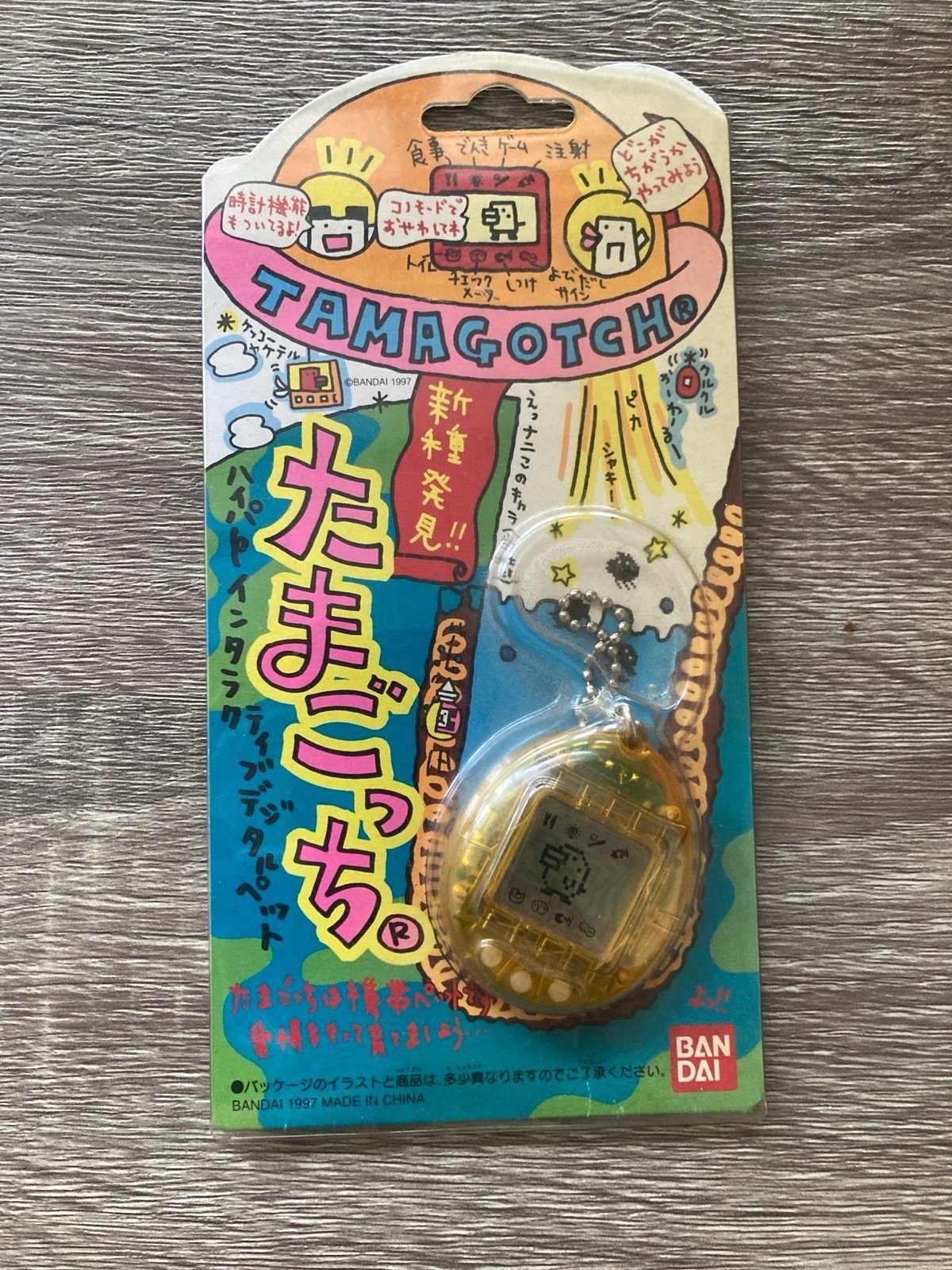Clear Yellow Tamagotchi Virtual Pet Japanese Version (1997)
