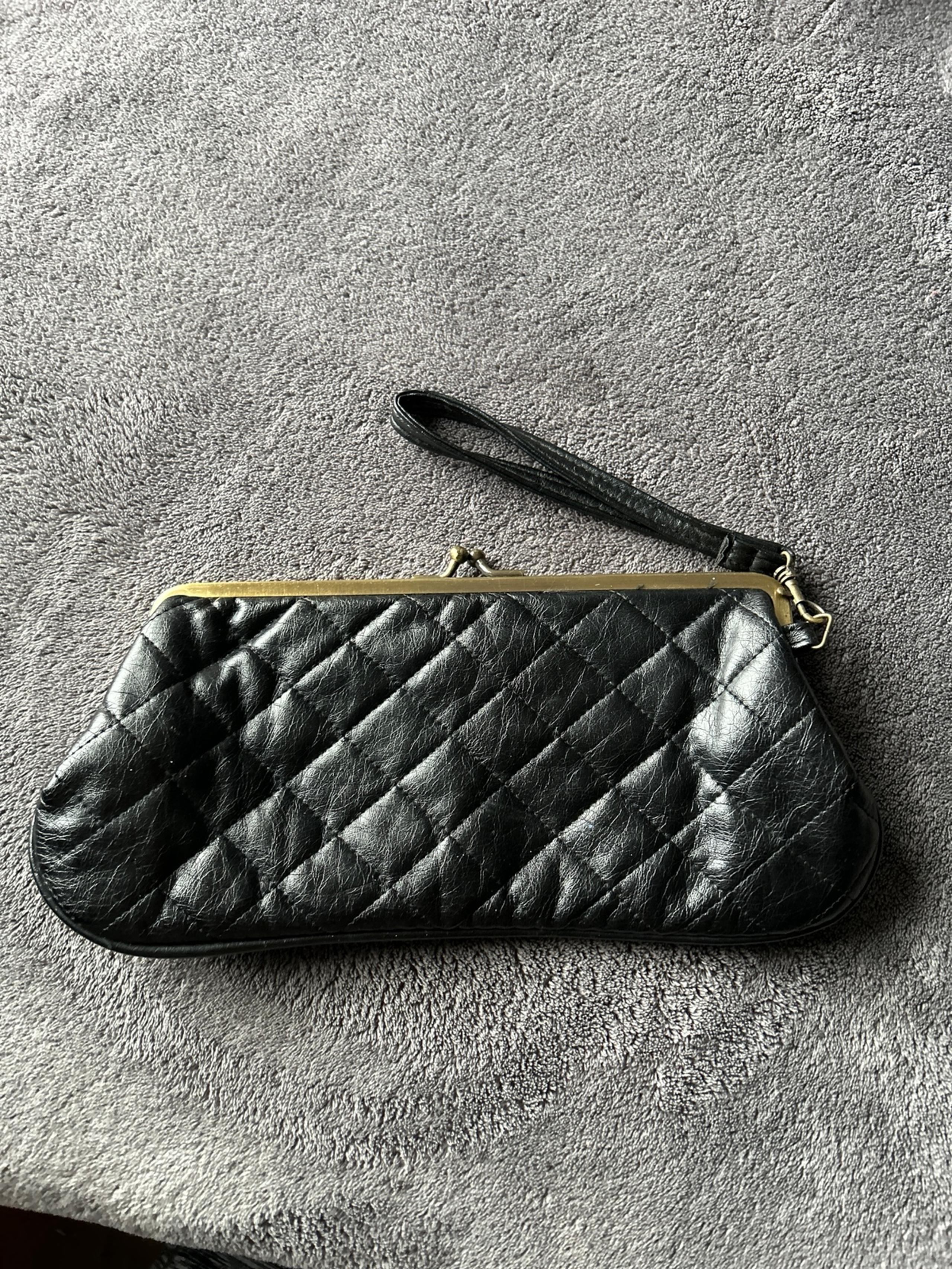 Wristlet black leather clutch