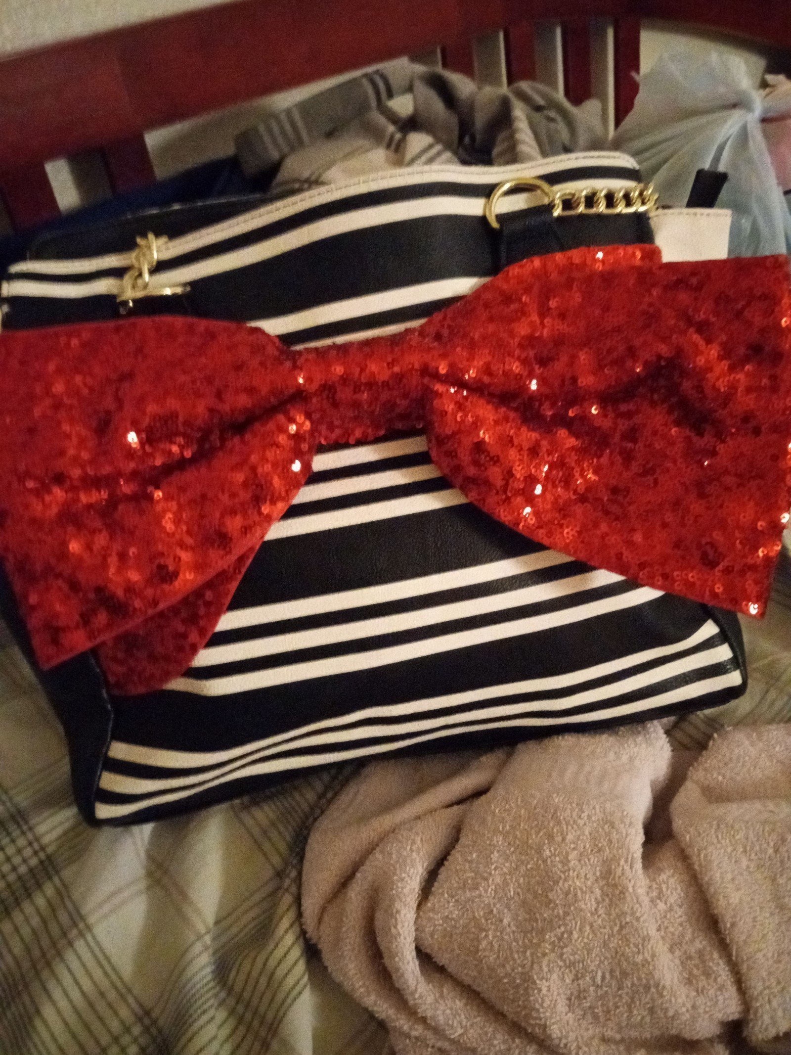 'BETSY JOHNSON SEQUIN RED BOW PURSE . RETAIL VALUE 300.00
