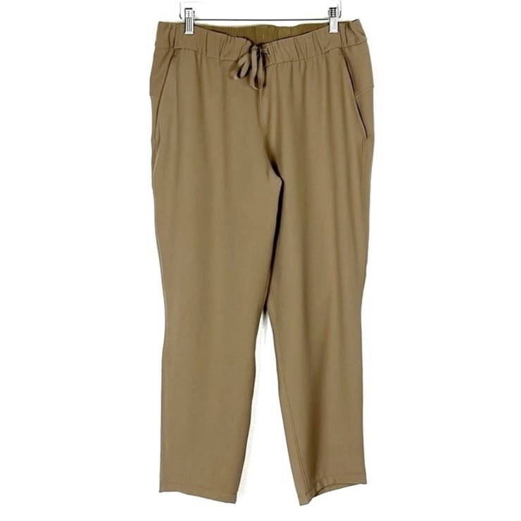 Lululemon On The Fly Pant relaxed Luxtreme Frontier Tan pants size 12
