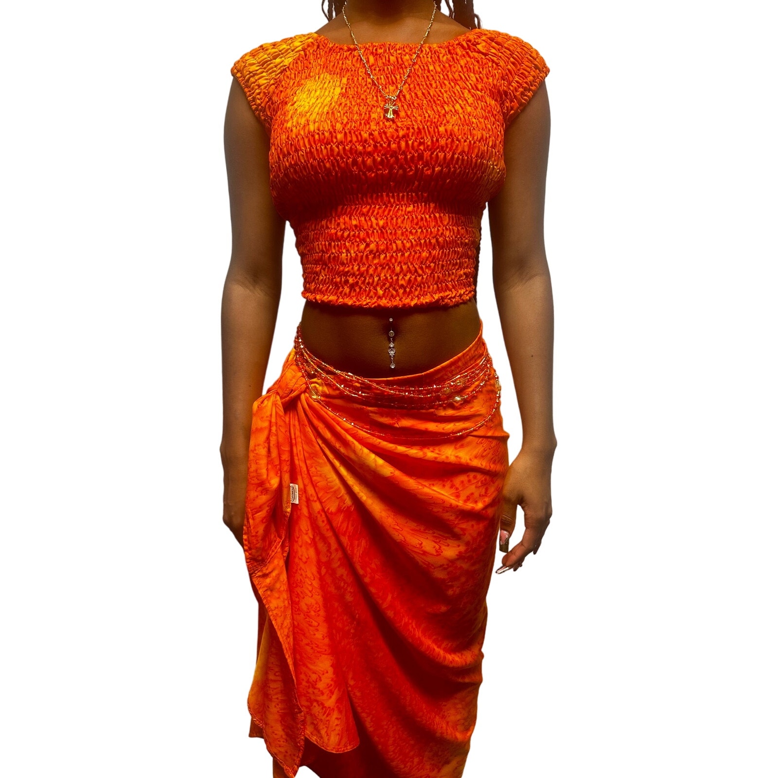 Gorgeous vibrant orange vacation co-ord set with crop top and sarong skirt