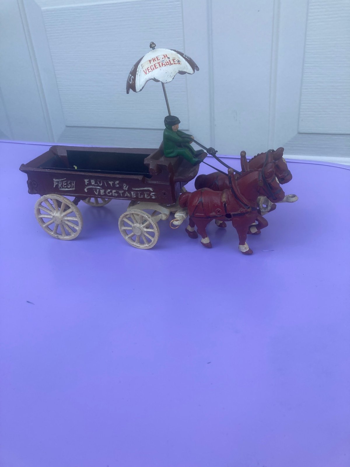 Vintage cast iron fruit wagon