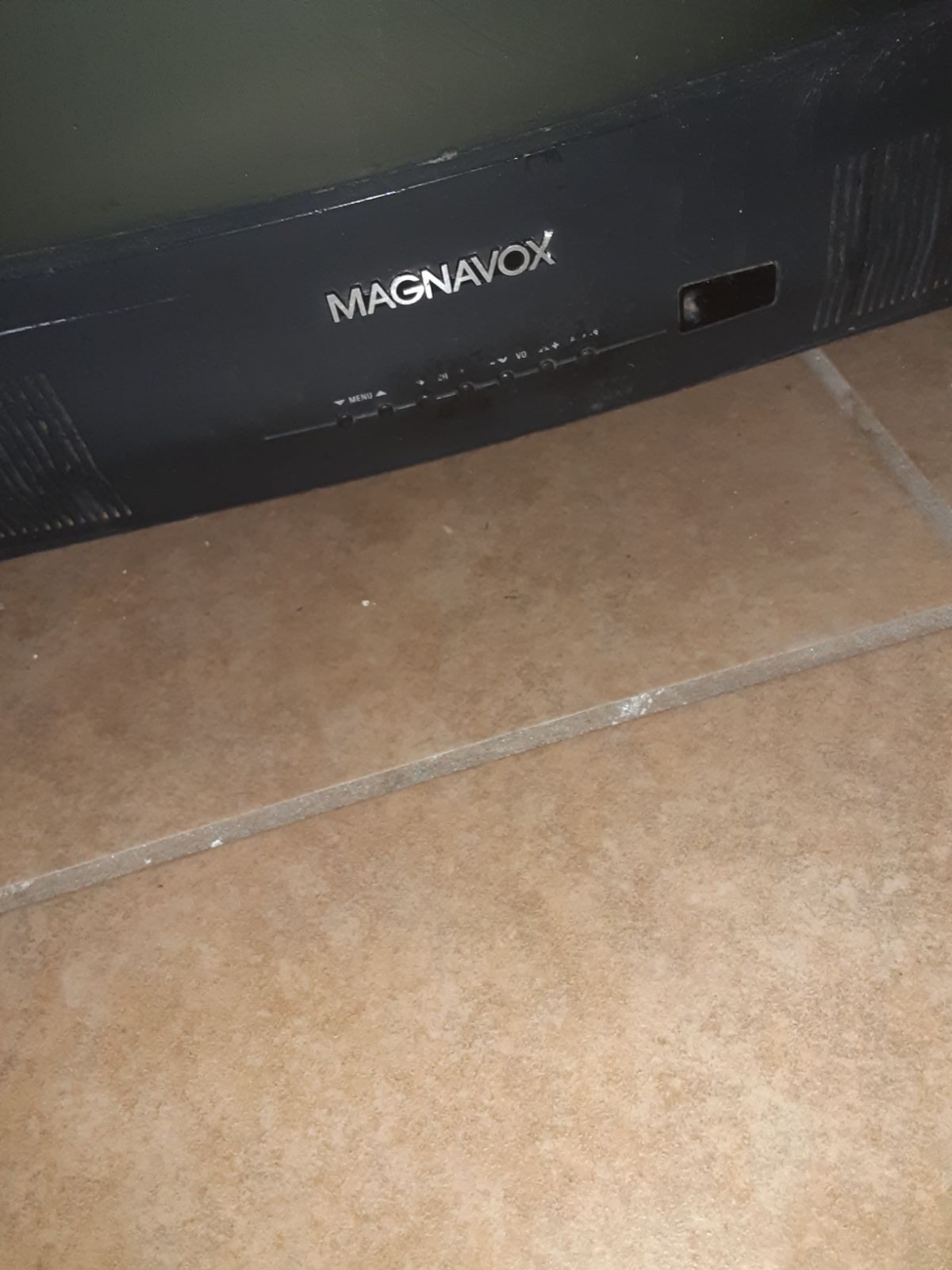 2Old school TV's one xbox silver sony and other black magnavox both show great p