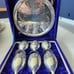 Silver plated goblet shot glasses and a serving dish