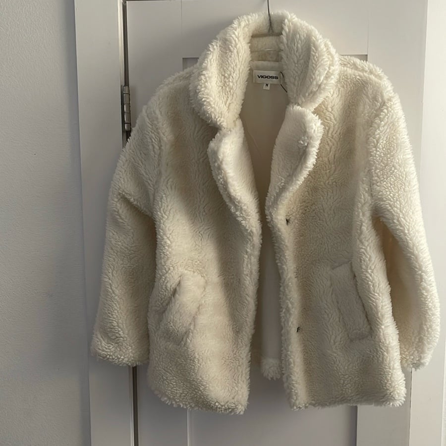 White faux fur coat