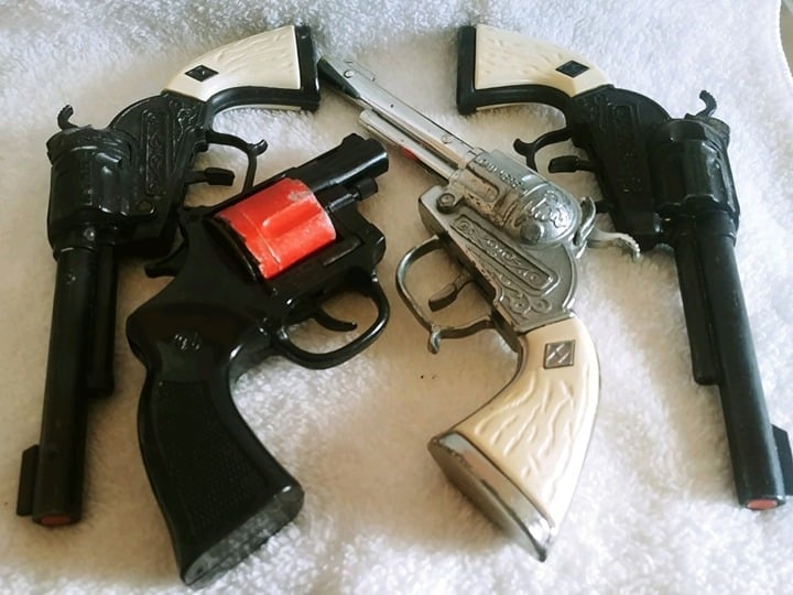 4 Toy Guns-3 Hubley Diamond H Toy Cap Guns (2 Black 1 Silver) & 1 Police Toy Gun
