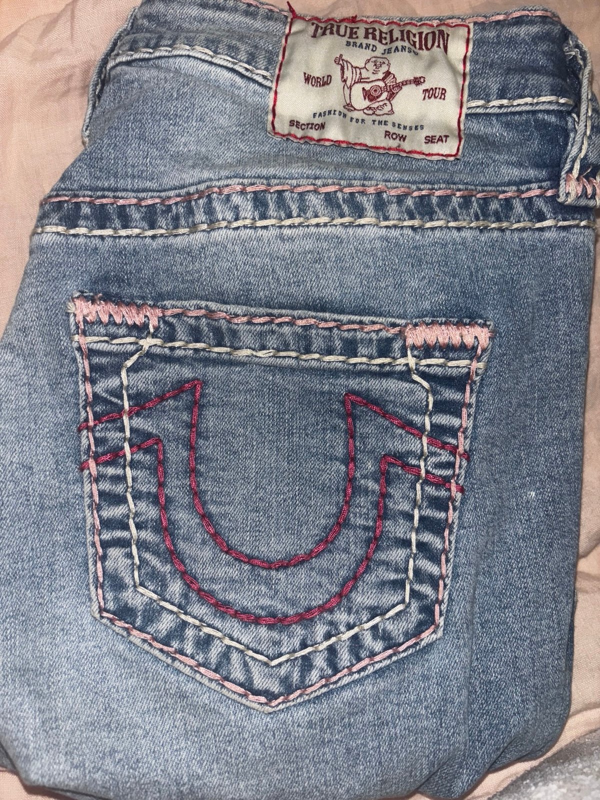 True Religion Pink and Blue Denim Jeans with Signature Stitching