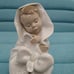 Lladro nao all bundled up