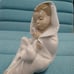 Lladro nao all bundled up