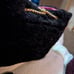 Carpisa woman's collection fushia reversible black faux fur . 8 by 10