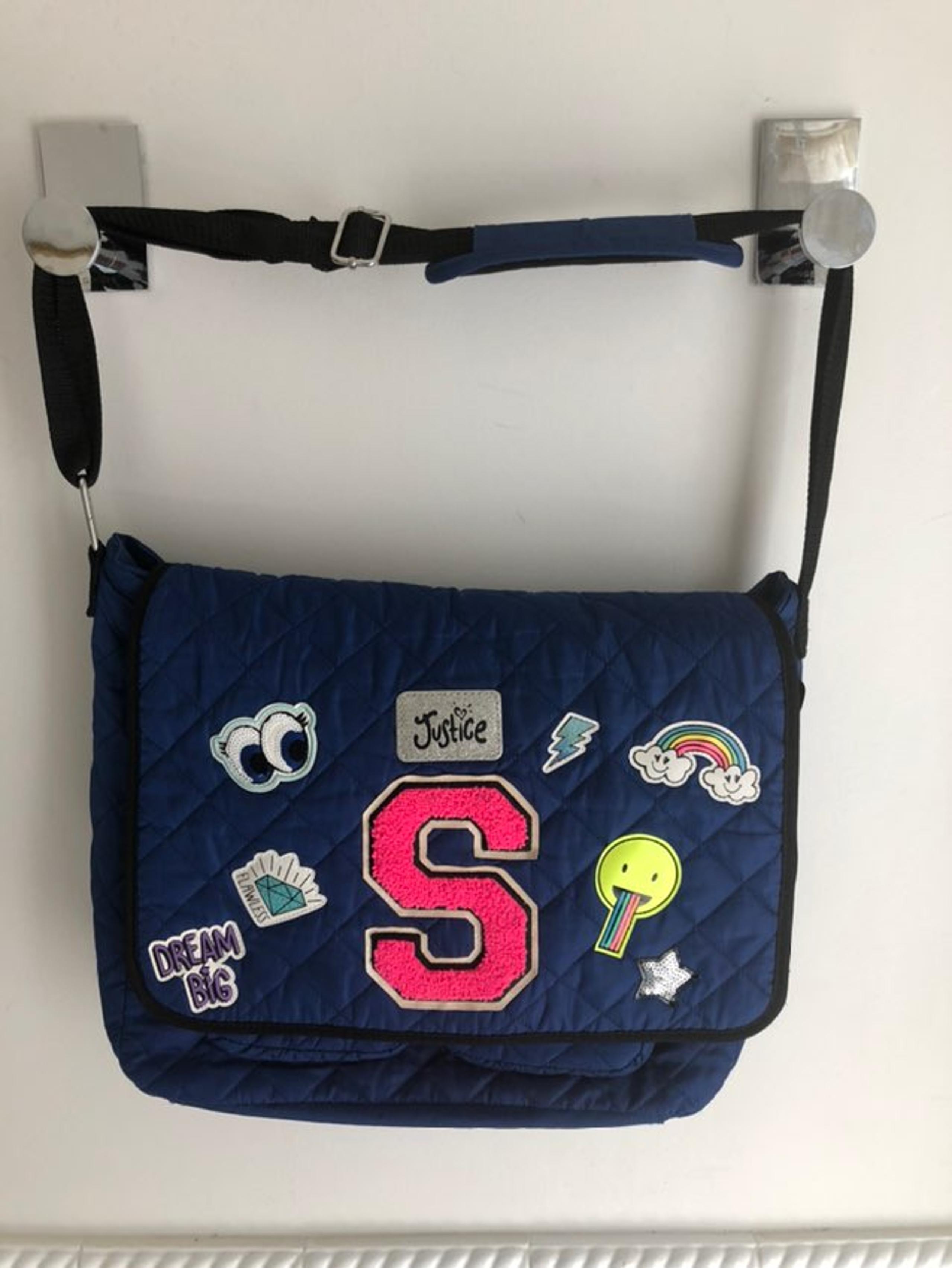 Justice blue crossbody bag w appliques
