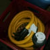 Camper plug attaches to camper