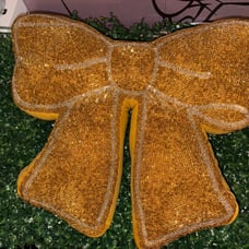 2 glitz and glimmer gold bow pillow