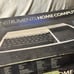 Vintage Texas Instruments TI-99-4A Home Computer w/games, reference guide Tested