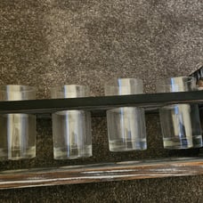 Torched wood beer flight board serving set with chalkboard panels and 4 glasses