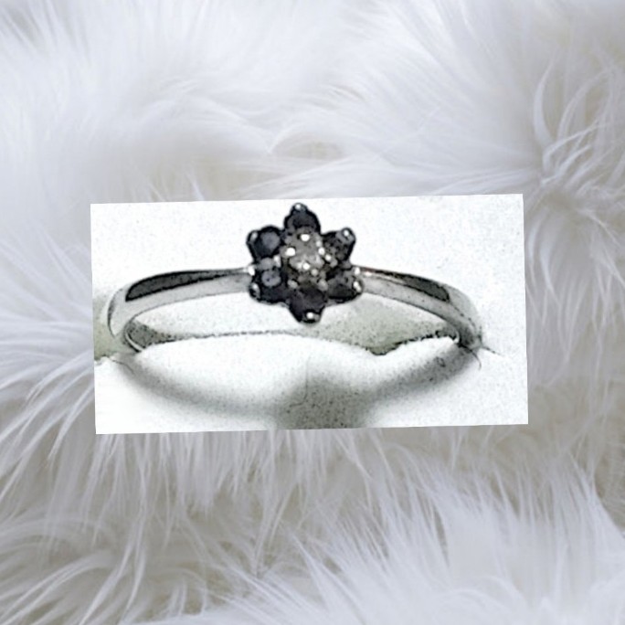 10k White Gold Ring with Blue Sapphires and a Small Round Diamond in the Center