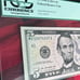 2013 series 5 dollar bill graded 65